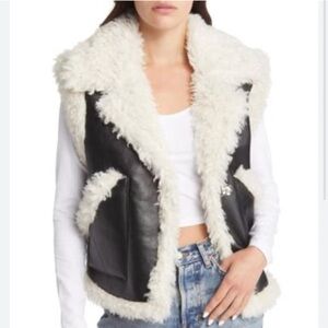 Topshop faux shearling vest with faux fur lining in black.